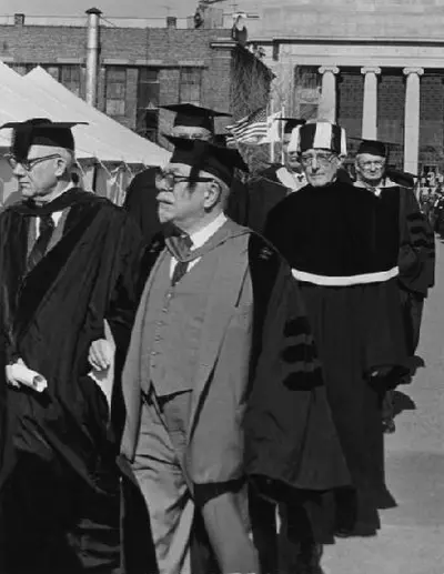 Wiener in academic procession wearing doctoral cap and gown