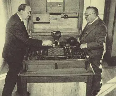 Wiener and colleague playing chess with an early computing machine